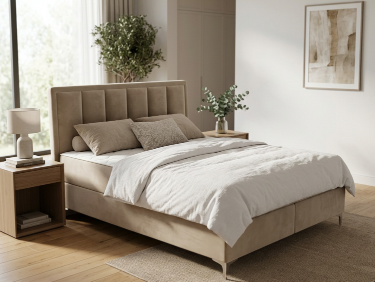 Beige upholstered bed with white bedding in a bright, minimalist bedroom flanked by wooden nightstands and lamps on each side.