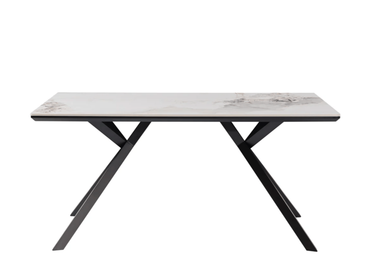 Modern rectangular table with a white marble top and black angular metal legs.