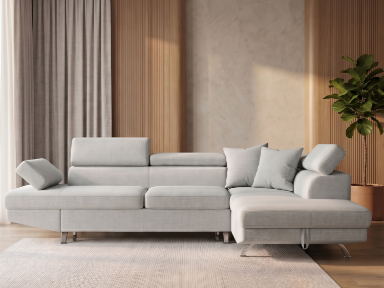 Light gray modular sectional sofa with cushions in a modern living room.
