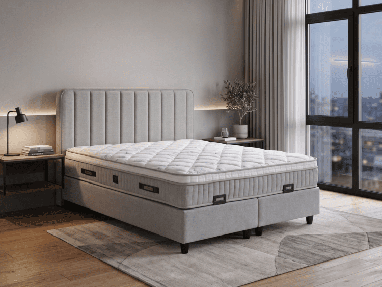 Modern grey upholstered king bed with a tufted headboard in a contemporary bedroom, sized with two nightstands and a city view through large windows.