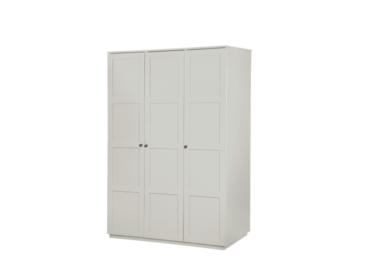 Tall white wardrobe with three paneled doors and small round knobs.