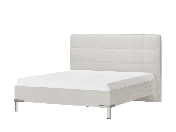 White platform bed with a tall, tufted, upholstered headboard and metal legs