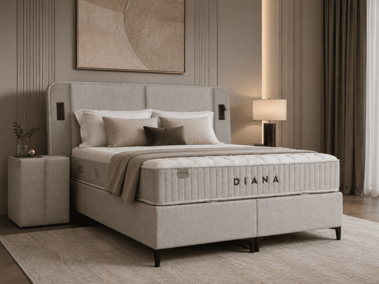 Luxurious beige upholstered bed with tufted headboard and neutral bedding in a calm, elegant bedroom.